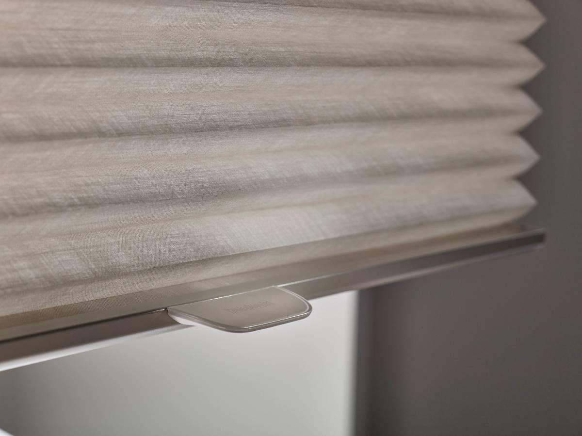 Homepage 8 Hunter Douglas pull down cellular shades covering a window at Beyond Shades near Chicagoland, IL
