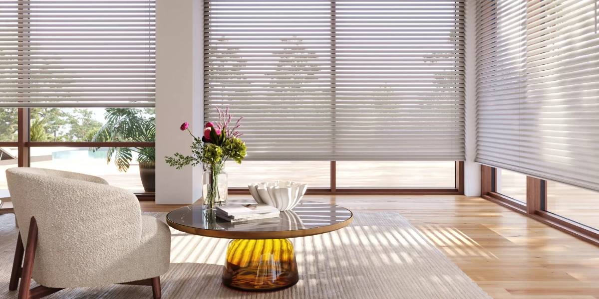 Hunter Douglas Aria® Soft Blinds covering three large living room windows near Chicagoland